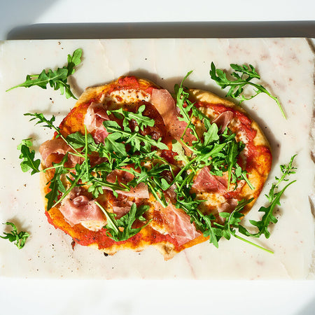 Prosciutto arugula pizza made with Sonoma Gourmet