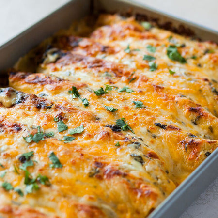 Spinach alfredo chicken enchiladas made with Sonoma Gourmet