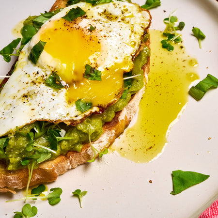 Basil on basil avocado toast made with Sonoma Gourmet