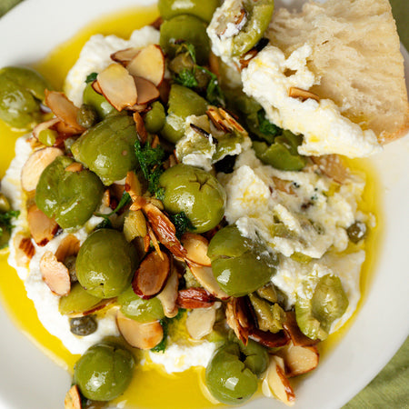 Sautéed garlic ricotta w/ crushed olives, almonds & lemon made with Sonoma Gourmet