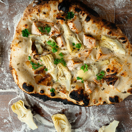 Lemon & herb ricotta chicken artichoke pizza made with Sonoma Gourmet