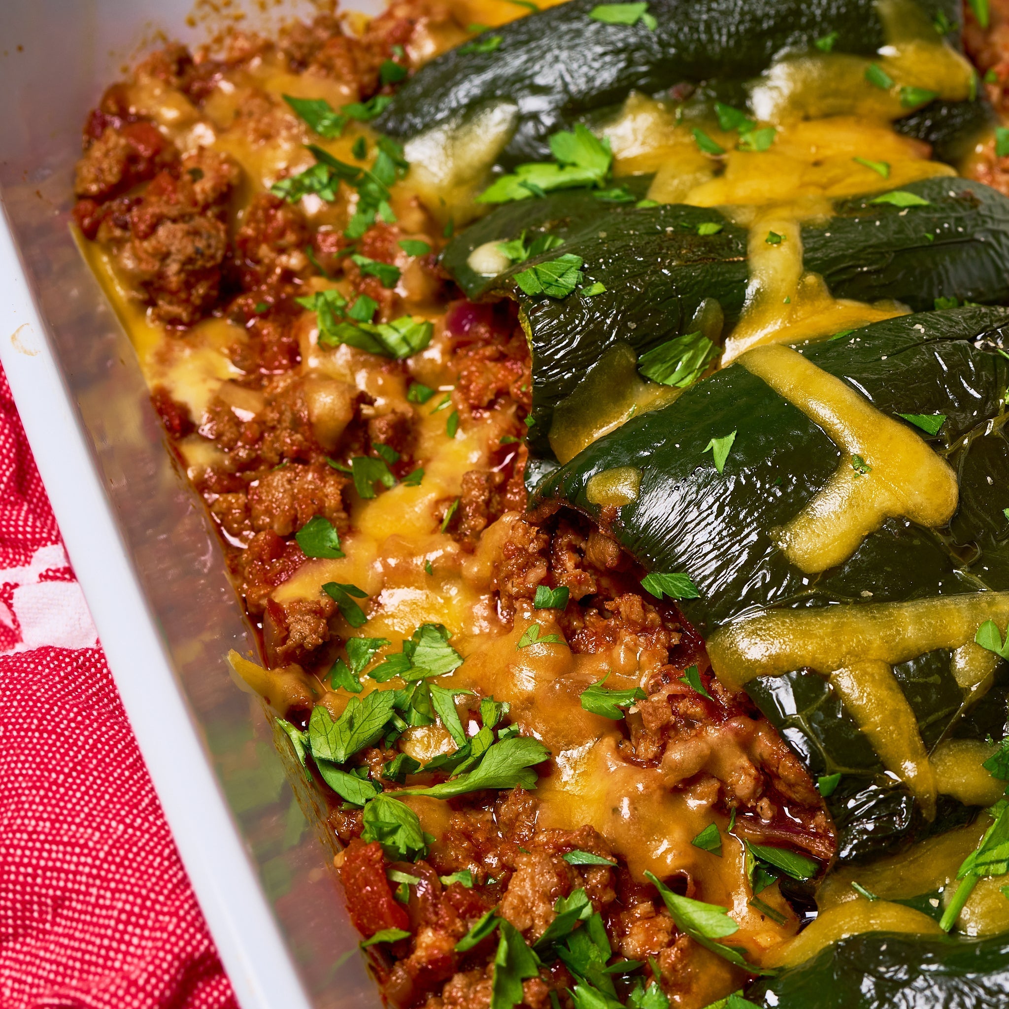 Stuffed saucy poblano peppers made with Sonoma Gourmet